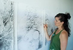 artist Siobhan Humston working on a canvas
