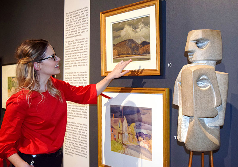 JNAAG Assistant Curator Sonya Blazek discusses a Group of Seven painting by A.J. Casson that is being exhibited for the first time.