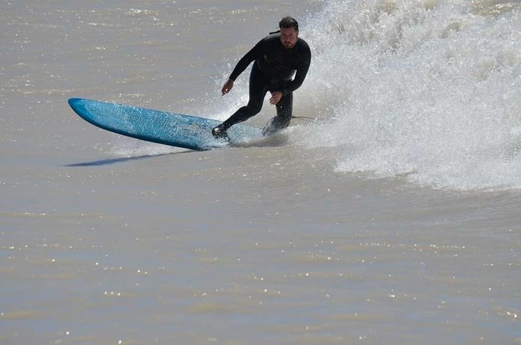 James Kirkpatrick surfing
